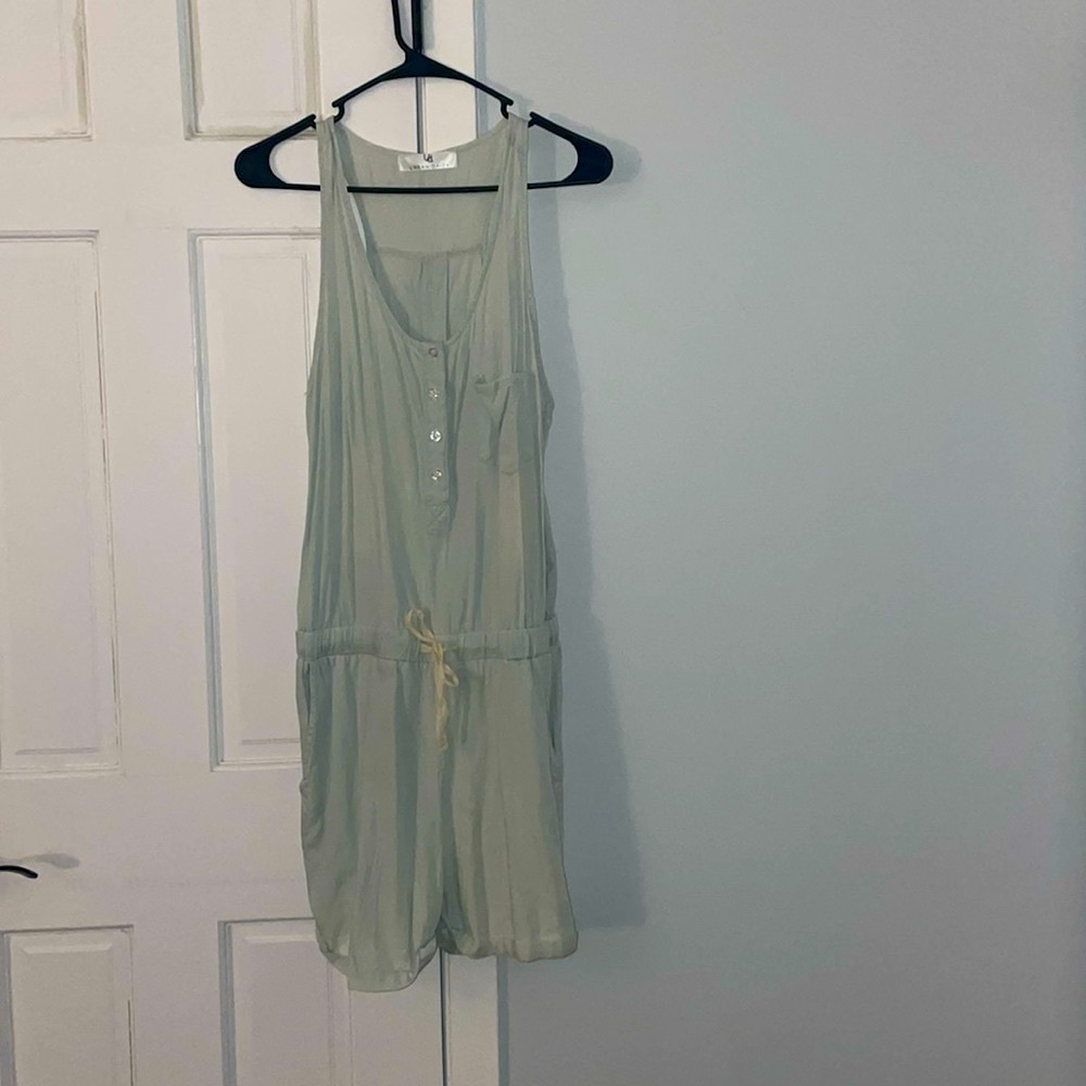 Light Blue Romper with buttons on the top side